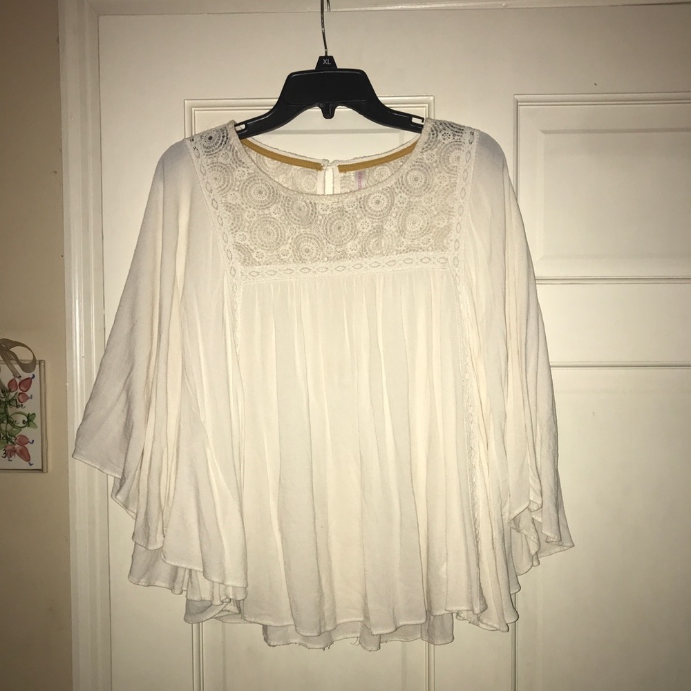 Flowing off white top